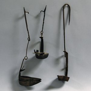 Three Wrought Iron Betty Lamps and Hangers