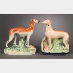 Two Staffordshire Greyhound Figures