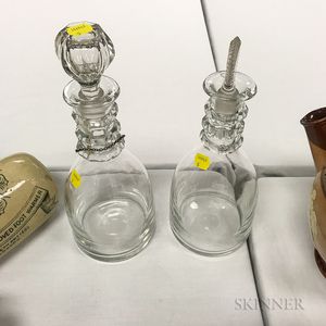 Two Colorless Glass Decanters