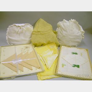 Three Sets of Linen Napkins and Place Mats, Two Embroidered Hot Water Bottle Covers, and a Machine Lace Overski...