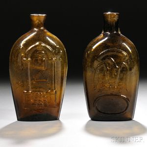 Two Amber Blown-molded Glass Eagle Flasks