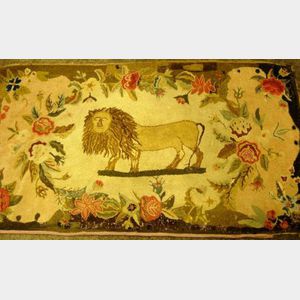 Hooked Rug with Standing Lion within Floral Border.