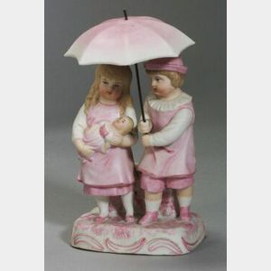 Bisque Figure of Boy and Girl with Umbrella