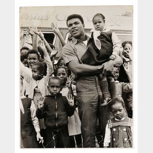 Malcolm X (1925-1965) and Muhammad Ali (b. 1942) Eight Photographs Taken by Robert Haggins (1922-2006)