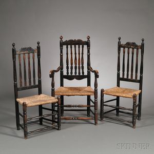 Three Black-painted Bannister-back Chairs