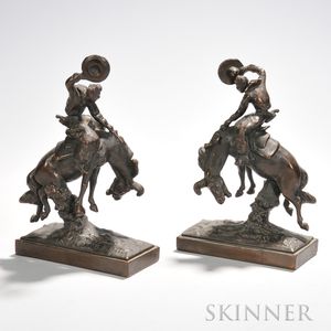 After Paul Herzel (German/American, 1876-1956) Bronco Buster/A Pair of Bookends. Both signed (C) PAUL HERZEL on the base. Bronzes wit