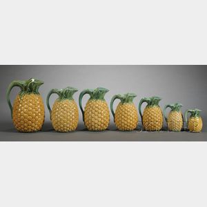 Seven Graduated Mintons Majolica Pineapple Pitchers