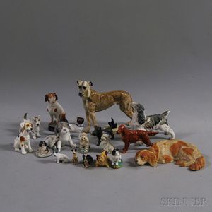 Nineteen Ceramic and Metal Dog Figurines
