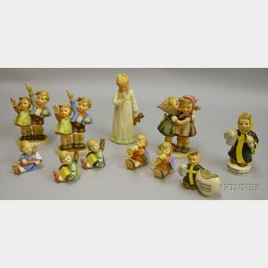 Eleven Hummel and Goebel Ceramic Figures and Figural Candleholders.