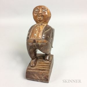 Carved and Stained Maple Figure of a Man