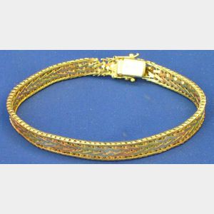 14kt Tri-color Gold Flex-lock Bracelet.