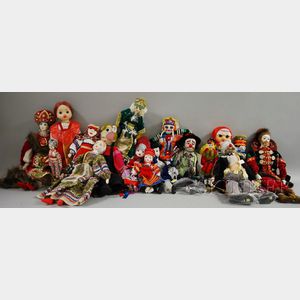 Approximately Fifteen Mostly Russian Porcelain Faced Dolls