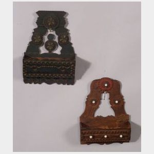 Two Painted and Notch-carved Wall Pockets