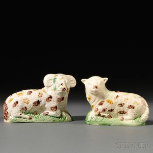 Assembled Pair of Staffordshire Cream-colored Earthenware Ram and Ewe Figures