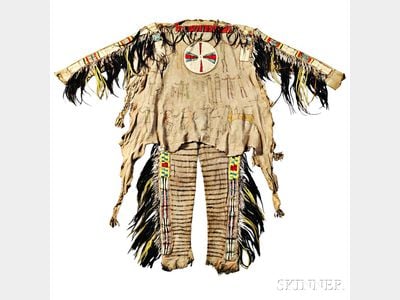 Sold for: $663,000 - Rare and Important Blackfeet Chief's Shirt and Leggings