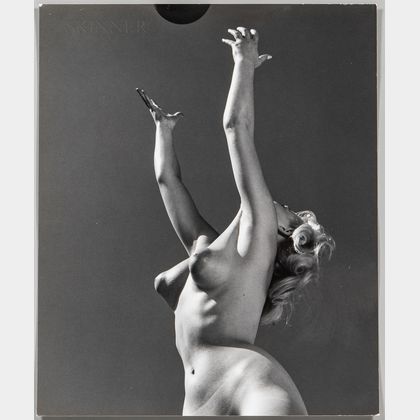 André de Dienes (Hungarian/American, 1913-1985) Woman with a Ball