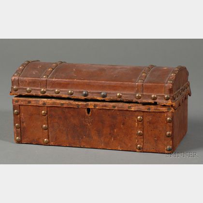 Small Hide-covered Dome-top Trunk Lined with Rhode Island Five Dollar Notes