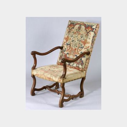 Pair of French Empire Fautueils, 19th century, each with scrolled backrest and turned legs. 