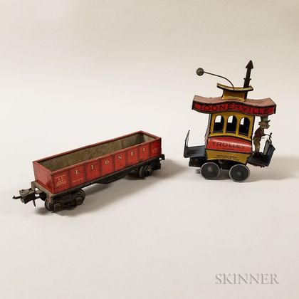 Fontaine Fox Tin Mechanical "Toonerville Trolley" and Lionel Train Car. Estimate $300-500