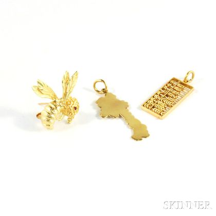 Three Small Gold Jewelry Items