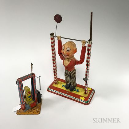 Two Lithographed Tin Swinging Toys