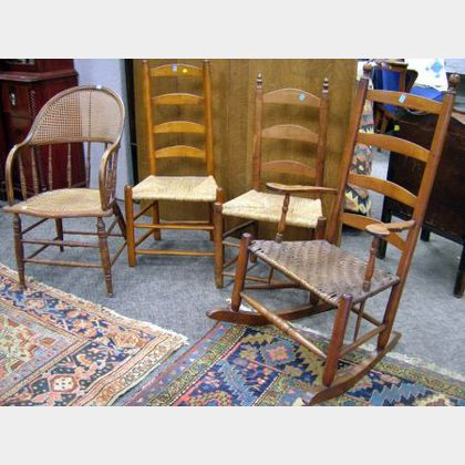 Slat-back Armrocker, Two Side Chairs, and a Caned Ash Sack-back Armchair. 