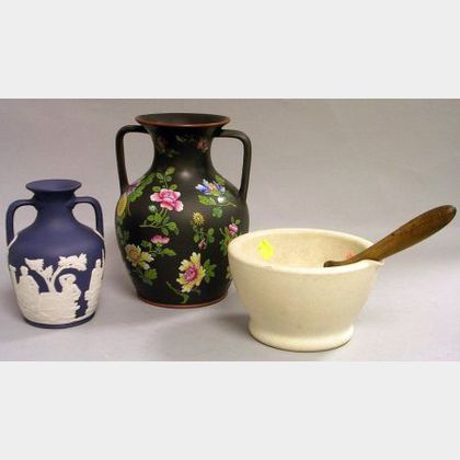 Wedgwood Mortar and Pestle, Dark Blue Jasper Dip Portland Vase, and an Enamel Floral Decorated Basalt Two-Handled Vase. 