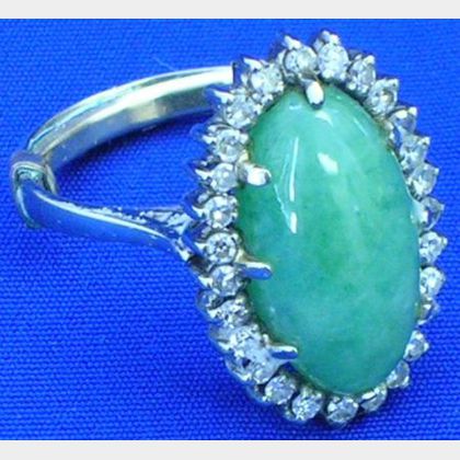 Cabochon Jade and Diamond Ring. 