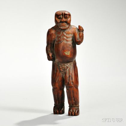 Wood Carving of a Figure