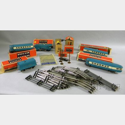 Several Pieces of Lionel Trains with Tracks