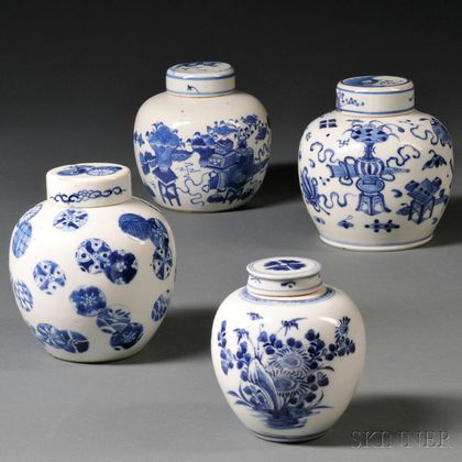 Four Small Blue and White Jars