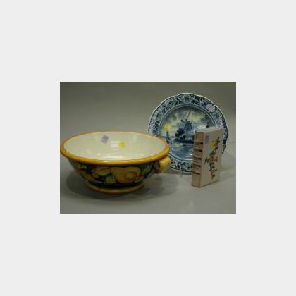 Tiffany & Co. Faience Book-form Bank, a Delft Bowl and a Faience Bowl. 