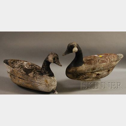Pair of Carved and Painted Wood Canada Goose Working Decoys. Estimate $400-600