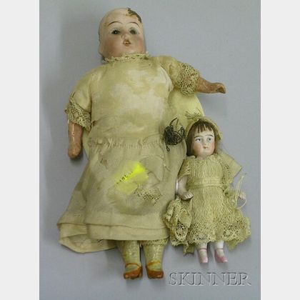 Two Small Dolls and a Lady's Parasol
