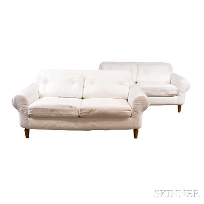 Pair of White Cloth-covered Love Seats