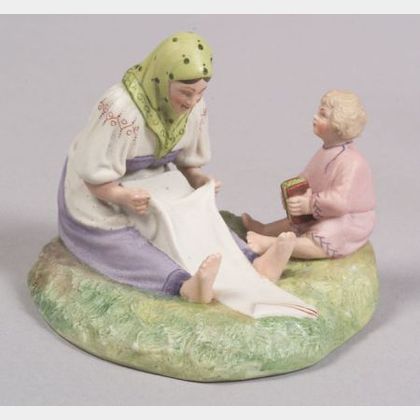 Gardner Porcelain Figure of a Mother and Child Ironing