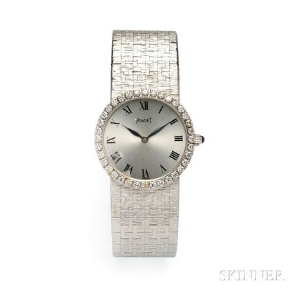 Lady's 18kt White Gold and Diamond Wristwatch, Piaget