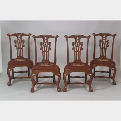 Set of Four Chippendale-style Carved Mahogany Side Chairs with Needlepoint Upholstered Seats. 