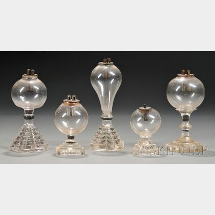 Five Small Free-blown Colorless Glass Lamps with Pressed Glass Bases