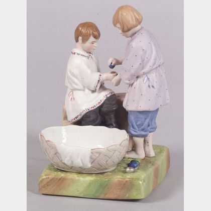 Gardner Bisque Porcelain Figure of Two Boys Cracking Colored Eggs