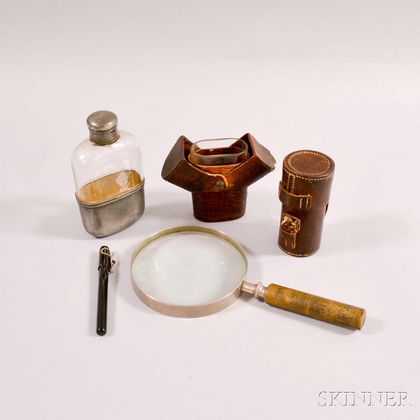 Leather Flask, a Cased Magnifier, a Glass Flask, and a Magnifying Glass. Estimate $50-75