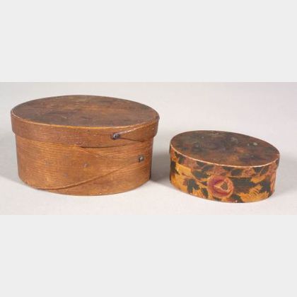 Two Small Covered Oval Storage Boxes