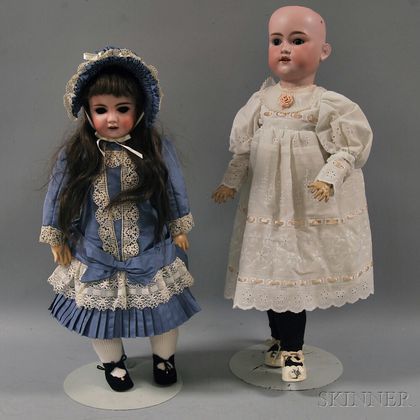 Two German Bisque Head Dolls, One George Borgfeldt
