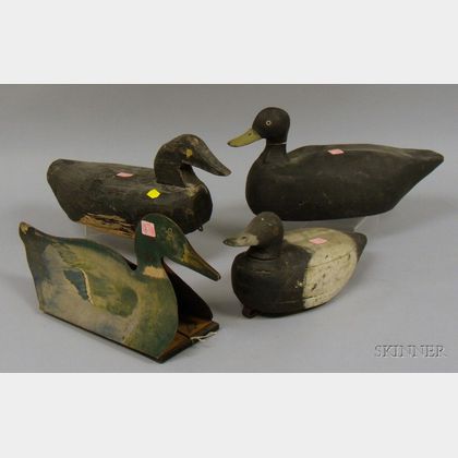 Three Carved and Painted Wooden Duck Decoys and a Wm. R. Johnson Co. Printed Fiberboard Duck Decoy. 