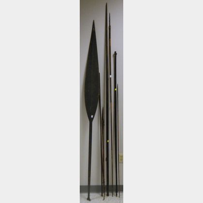 Painted Paddle and Ethnographic Spears and Bows