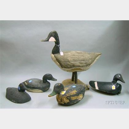 Four Carved and Painted Wooden Duck Decoys and a Carved and Painted Wooden Standing Canada Goose Decoy. 