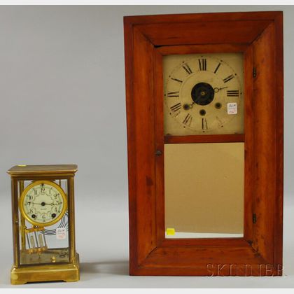Pine Ogee Shelf Clock and a Brass and Glass Mantel Clock