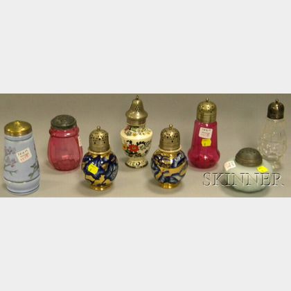 Eight Late Victorian Art Glass and Ceramic Sugar Casters
