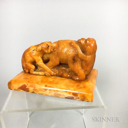 Carved Amber Composite Statue of Dogs