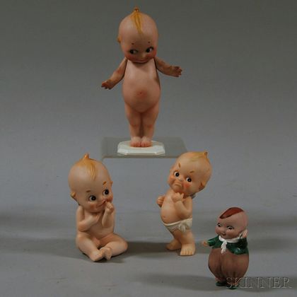 Four Bisque Kewpie and Kewpie-type Figurines